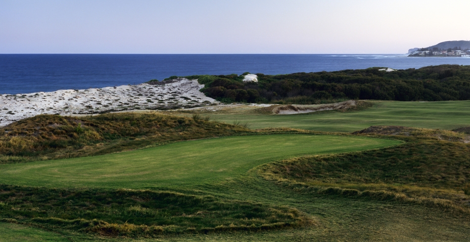 golf course with ocean